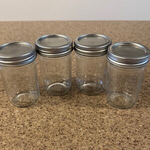 Set of 4 Clear Glass Mason Jars with Silver Lids